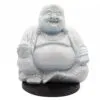 A pale crackled Laughing Buddha statue on a dark base, symbolising joy and abundance.