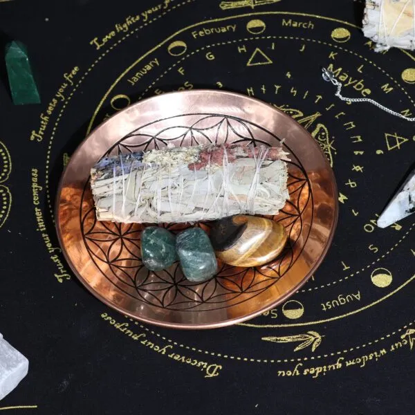 Best Housewarming Gifts With Personality. Smudge Sticks and brass offering plate.