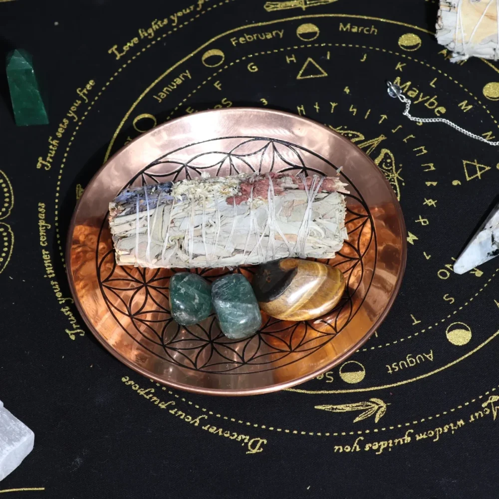 Best Housewarming Gifts With Personality. Smudge Sticks and brass offering plate.