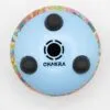 Sky-blue steel tongue drum base with three black rubber feet and a colourful rim.