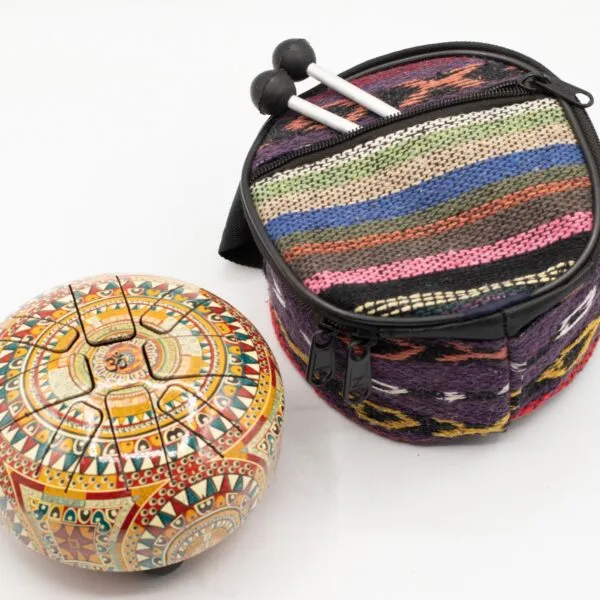 A colourful steel tongue drum alongside a patterned carrying bag with drumsticks.