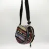 Multicoloured round woven wool crossbody bag featuring a geometric diamond pattern and zip closure.