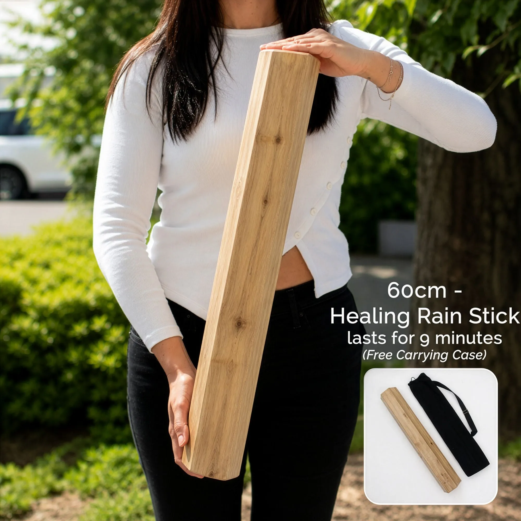 Woman holding a Manglid Wood Healing Rainstick
