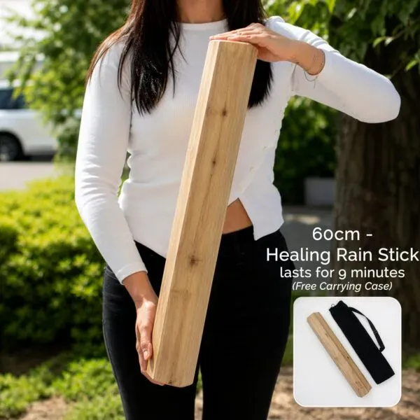 Long Wooden Rain Sticks - Woman holding a Manglid Wood Healing Rainstick