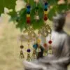 Indian Chimes - Brass Om with Chakra Beads - 7 Bells