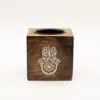 bG9jYWw6Ly9tZWRpYS8xRy9HRC82MFIzMEMxSjY0VjNHRDFHLzRmYTg1MDIxLmpwZw.webp Square Mango Wood Oil Burner - Hamsa