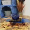bG9jYWw6Ly9tZWRpYS9IRy9BRC82MFIzMEMxRzZSVjNBREhHLzEyNGZiYzJlLmpwZWc.webp Molton Glass Mini Blue Bowl on Wood