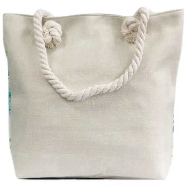 Beige cotton canvas beach bag with braided rope handles and subtle floral details.