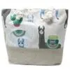 Beige cotton canvas beach tote bag with colourful cartoon llama print and rope handles.