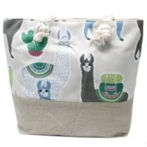 Beige cotton canvas beach tote bag with colourful cartoon llama print and rope handles.