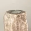 Tealight Candle Holder Natural Quartz Beige Rough Texture Rough natural beige quartz rock tealight holder with an unlit white candle.