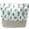 Cream canvas beach tote bag featuring a cactus pattern, taupe base and rope handles.