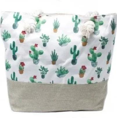 Cream canvas beach tote bag featuring a cactus pattern, taupe base and rope handles.