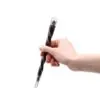 Hand holding a dark brown and silver magic spiral wand topped with a crystal orb.