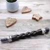 Magic Wand Carved Wood Brown With Amethyst Helix Handle Carved brown wooden magic wand with a purple amethyst crystal helix handle.