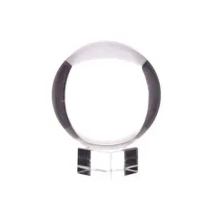 Clear 30mm crystal glass sphere resting on a transparent cubic display stand.