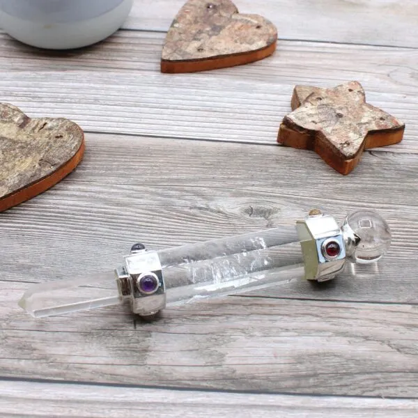Clear Quartz Crystal Wand Silver Metal Amethyst Sphere Clear quartz crystal wand with silver metal fittings, an amethyst, and quartz sphere.