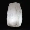 Himalayan Salt Lamp Natural Crystal White Warm Glow Illuminated rough-cut white Himalayan crystal salt lamp on a dark wooden base.