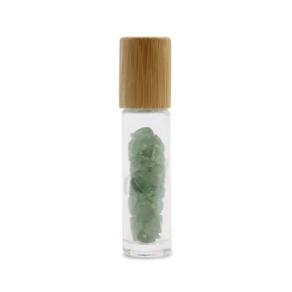 Glass vial filled with green aventurine gemstone chips and topped with a bamboo cap.