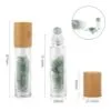 Green aventurine gemstone roller bottle with a bamboo lid and product dimensions.