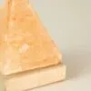 USB-powered natural Himalayan pink salt pyramid lamp on a marble base.