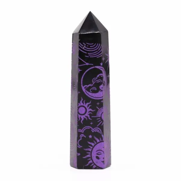Polished black obsidian crystal tower featuring purple glitter celestial sun and moon engravings.