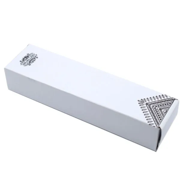 White cardboard jewellery gift box with an intricate black tribal print design.