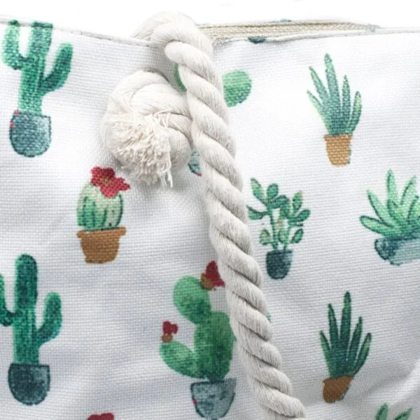 Textured white fabric with a colourful potted cactus print and natural rope trim.