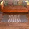bG9jYWw6Ly9tZWRpYS8xRy80Qy82MFIzMEMxRzZSVks0QzFHLzk4MDM2ZDQ3LmpwZWc.webp Indian Cotton Rug - 70x170cm - Grey