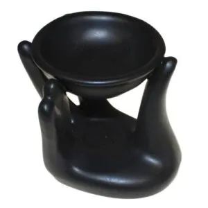 Matte black ceramic abstract swan flameless oil burner and aroma diffuser.