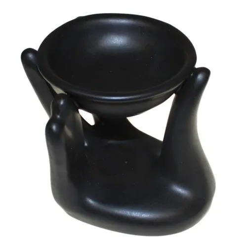 Abstract Swan Oil Burner Ceramic Matte Black Flameless Matte black ceramic abstract swan flameless oil burner and aroma diffuser.