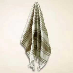 Striped Cloth Woven Cotton Brown And White With Tassels Folded brown and white striped woven cotton cloth with tassels and diamond pattern.