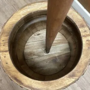 Butter Churn Barrel Wooden Brown Interior Dasher Pole Top-down view inside a vintage wooden butter churn barrel with a central dasher pole.
