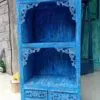 Storage Cabinet Rustic Wood Distressed Blue Carved Drawers Distressed blue rustic wooden cabinet featuring carved drawers and open shelves.