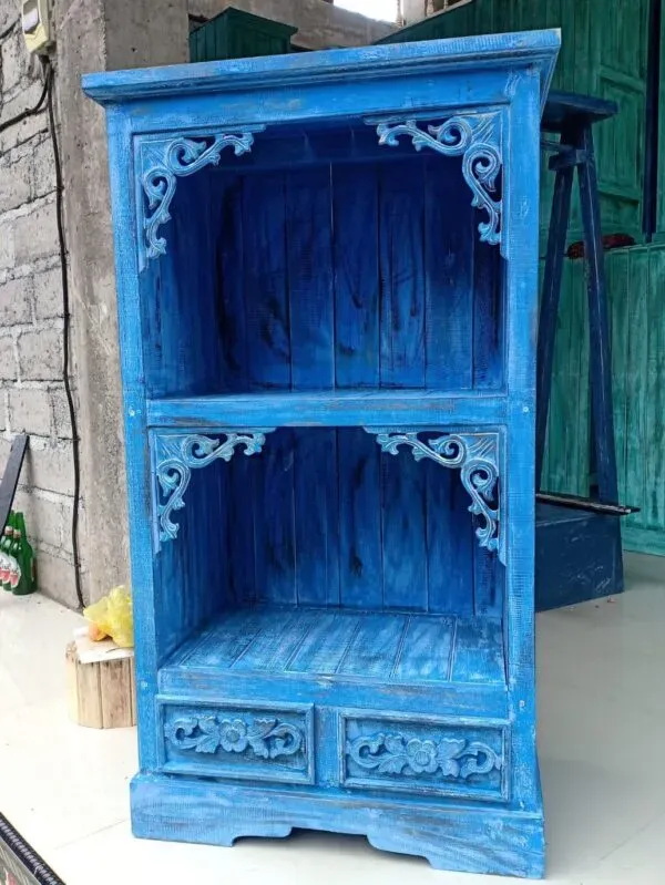 Storage Cabinet Rustic Wood Distressed Blue Carved Drawers Distressed blue rustic wooden cabinet featuring carved drawers and open shelves.