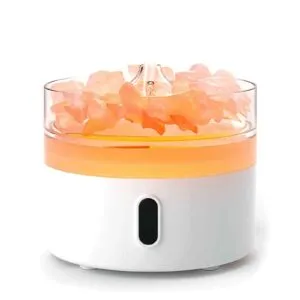 Himalayan pink salt lamp humidifier with a glowing orange band and cool mist.