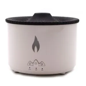 White electric essential oil diffuser with flame effect light and timer controls.